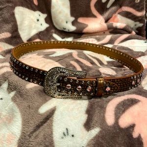 Gently used Girls belt size 28”